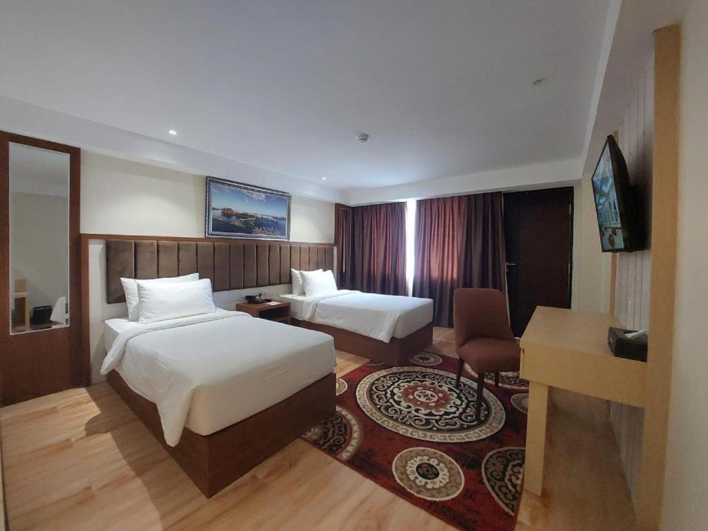 Grand Qin Hotel Banjarbaru Buitenkant foto